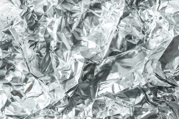 Silver crumpled foil banner background. Silver Texture, Silver Gradient background, Shiny and metal steel gradient.