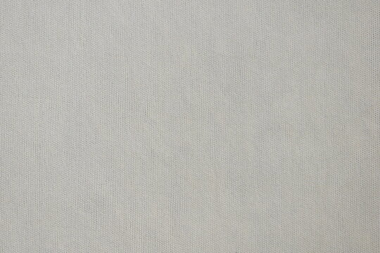 Light yellow color microfiber eyeglasses cleaning cloth textured background - Powered by Adobe