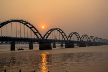 The Godavari Arch Bridge is a bowstring-girder bridge that spans the Godavari River in Rajahmundry, India. It is the latest of the three bridges that span the Godavari river at Rajahmundry. 