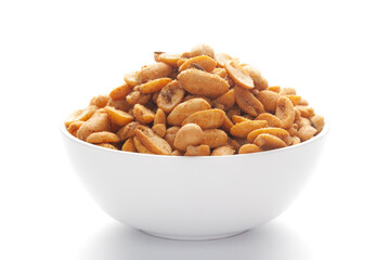 Close up of Heeng jeera Peanuts mixture Indian namkeen (snacks) on a ceramic white bowl.