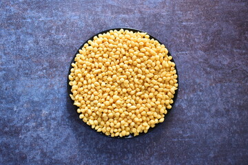 Fried small Boondi balls spicy Indian snack made from chickpea flour