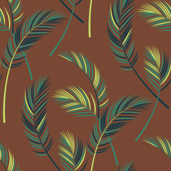 Fototapeta na wymiar palm leaves on a brown background. seamless pattern