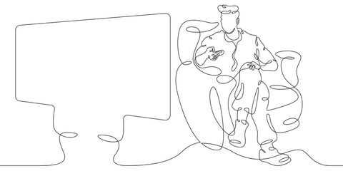 Young man watching television at home on the couch. One continuous drawing line  logo single hand drawn art doodle isolated minimal illustration.