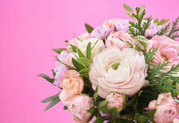 Fototapeta na wymiar Beautiful bouquet of mixed different flowers on pink background, greeting, gift