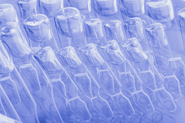 Glass medical ampoule vial for injection. Medicine is liquid sodium chloride with of aqueous...