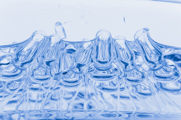 Glass medical ampoule vial for injection. Medicine is liquid sodium chloride with of aqueous...