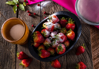 strawberries glazed with powdered sugar