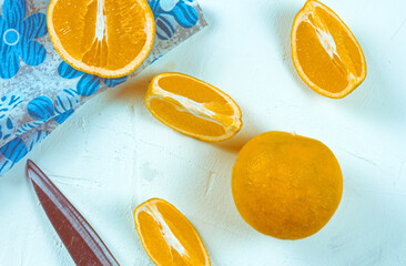 orange fruit on the table and kitchen handkerchief