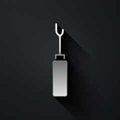Silver Awl tool with wooden handle icon isolated on black background. Work equipment tailor industry. Long shadow style. Vector