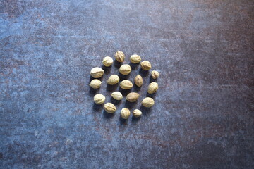 Fototapeta na wymiar Raw whole dried seed of Terminalia bellirica fruit