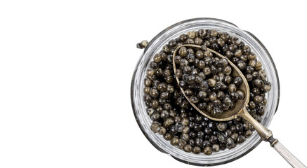 Glass jar with natural, delicious black caviar and silver spoon in it, isolated on white background.