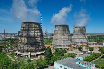 Pavlodar, Kazakhstan - 05.29.2015 : Cooling towers and pipes of various compartments of a large...