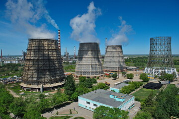 Pavlodar, Kazakhstan - 05.29.2015 : Cooling towers and pipes of various compartments of a large...