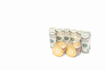 A circular roll of dollar bills with bitcoins on a white background
