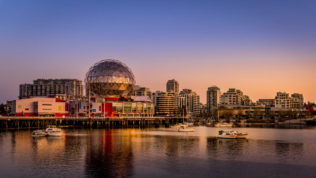 Vancouver Skyline At Sunset At The Eastern Shore Of False Creek Inlet With The Science Center Globe In British Columbia, Canada