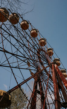 Abandoned amusement park. ferris wheel in an amusement park in Pripyat. Unhappy childhood.