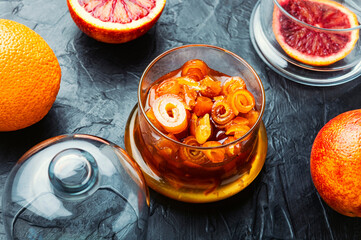 Orange jam in a glass jar