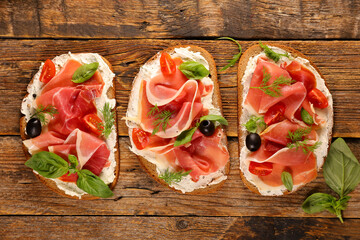 sandwich- bread slice with cream cheese and prosciutto ham
