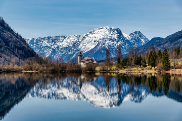 Fototapeta na wymiar Peaceful Lake Grundlsee With Alps Reflecting in Lake, Styria in Austria, Springtime in Salzkammergut