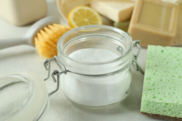 Cleaning concept with eco friendly cleaning tools on white textured table