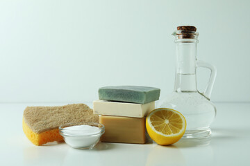 Cleaning concept with eco friendly cleaning tools on white table