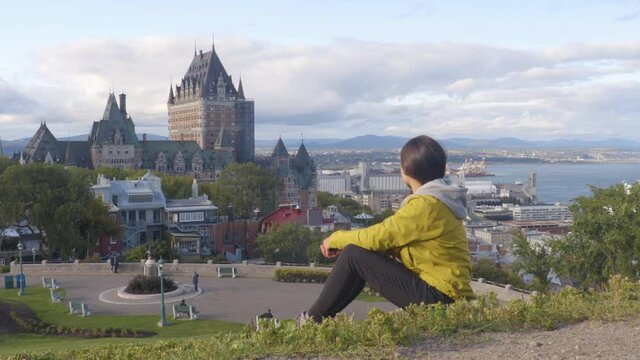Canada travel Quebec city tourist enjoying view of Chateau Frontenac castle