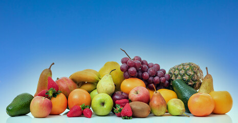 Variety of fruits on white background