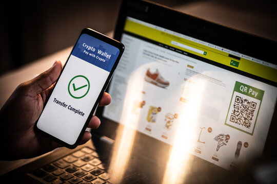 Mobile phone with QR pay app - Powered by Adobe