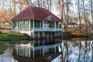 Fototapeta na wymiar Palmse manor in Estonia. Sunny autumn day with bright foliage.