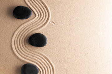 Japanese zen garden with stone in raked sand