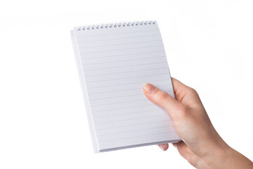 Cropped female hand holds a blank notepad with copy space, isolated on white background