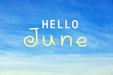Fototapeta premium Hello June. Beautiful blue sky with clouds
