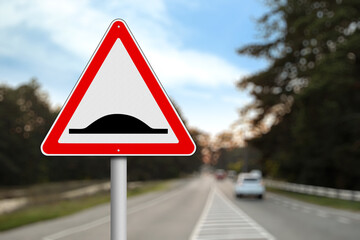 Sign Speed Bump near asphalt road outdoors