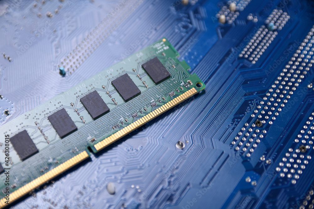 Poster Computer memory RAM on motherboard background . Close up. system, main memory, random access memory, onboard, computer detail. Computer components . DDR3. DDR4. DDR5