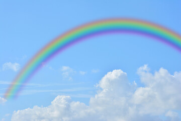Rainbow in blue sky