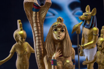 Still life with egyptian figures cleopatra, anubis - obrazy, fototapety, plakaty