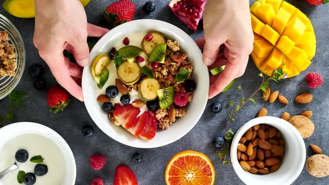 health food- oatmeal, granola with yogurt and fresh fruit