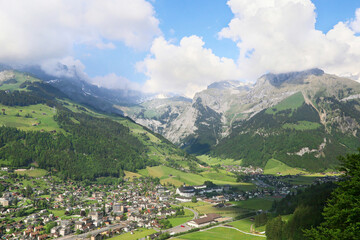 Fototapeta na wymiar Swiss town Engelberg at the foot of the mountains, Switzerland. on the edge of town is the Benedictine monastery