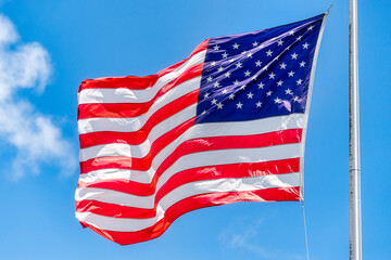 American or USA flag flying in the wind