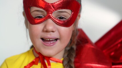 girl superhero portrait face. feminism a happy family a close-up home kid dream concept. child superhero in mask. Beautiful winner kid girl superhero. child play hero. business leader concept