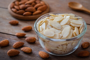 Almond slices in glass bowl.