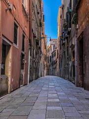 Fototapeta na wymiar Small street in Venice without any people during crisis COVID-19, Italy