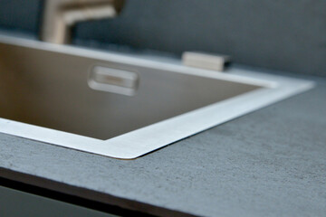 Stainless steel kitchen sink in a modern style