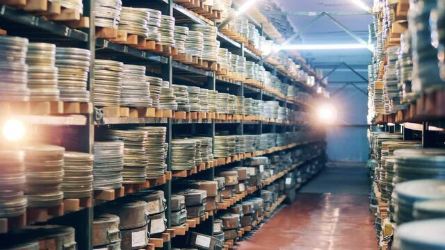 Cinema archive with multiple tape movies in cases