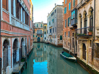 Fototapeta na wymiar Small canal street in Venice, Italy