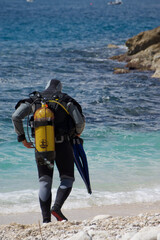 scuba diving on the beach