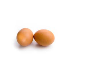 Two fresh eggs on white background. Copyu space
