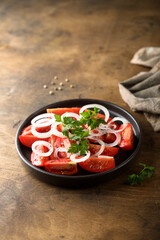 Healthy tomato salad with onion