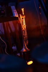 Silhouette of a trumpet in an orchestra in colorful light - 426334066