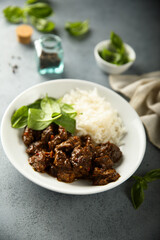 Homemade beef ragout with spinach and rice